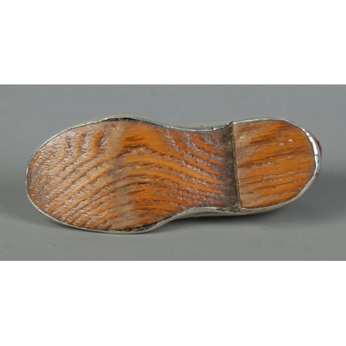 121 - A George V silver pin cushion formed as a shoe. Assayed Birmingham 1920 by S Blanckensee & Son Ltd. ... 