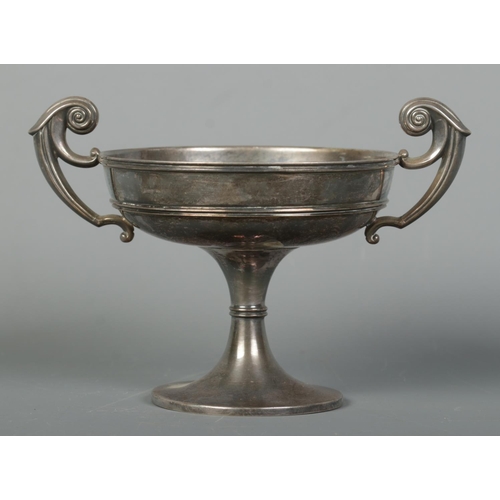 129 - An Edwardian silver twin handled pedestal bowl. Assayed Sheffield 1904 by Henry Wigfull. Height 11.5... 