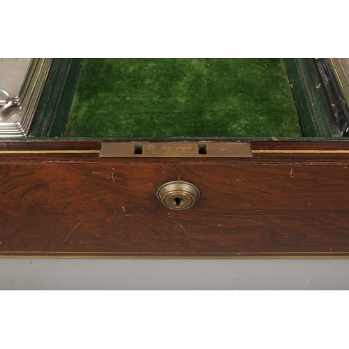 134 - A William IV brass bound rosewood vanity box with fitted silver and glass jars. The box and jars all... 