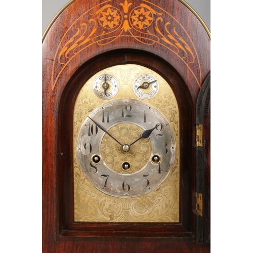 137 - A Junghans inlaid mahogany bracket clock. Having brass dial and subsidiary dials for speed and chime... 