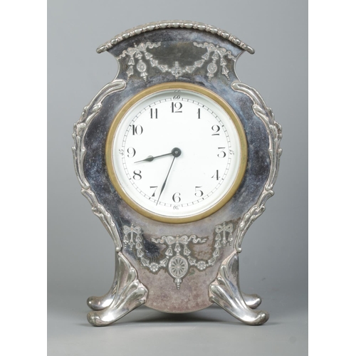 139 - An early 20th century Lloyd, Payne & Amiel silver plated mantel clock, housing French 8 day movement... 