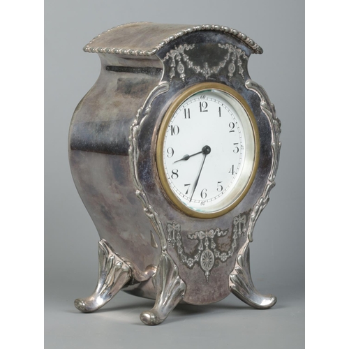 139 - An early 20th century Lloyd, Payne & Amiel silver plated mantel clock, housing French 8 day movement... 