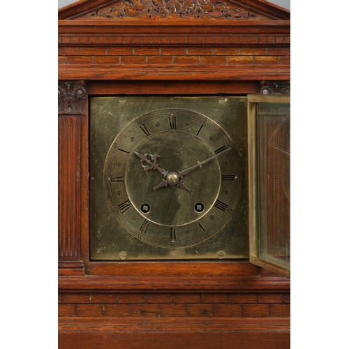 140 - A Winterhalder & Hofmeier carved oak bracket clock. Having square brass dial and Roman numeral marke... 