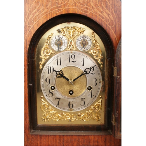 142 - A Junghans inlaid mahogany bracket clock. Having brass dial and subsidiary dials for speed and chime... 