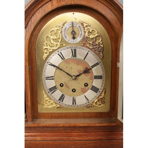 143 - An oak cased Gustav Becker bracket clock. With brass dial, Roman numeral markers and subsidiary dial... 