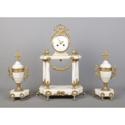 144 - A French alabaster clock garniture with gilt metal mounts by Vincenti & Cie, Paris. Height of clock ... 