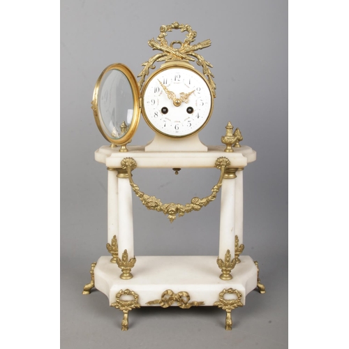 144 - A French alabaster clock garniture with gilt metal mounts by Vincenti & Cie, Paris. Height of clock ... 