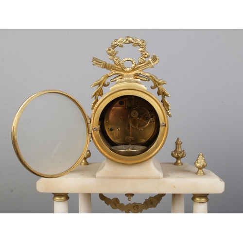 144 - A French alabaster clock garniture with gilt metal mounts by Vincenti & Cie, Paris. Height of clock ... 