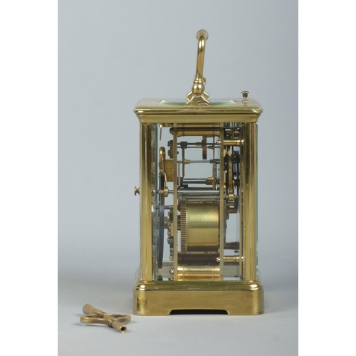 146 - An early 20th century brass and glass repeater carriage clock. Having swing handle, Roman numeral ma... 