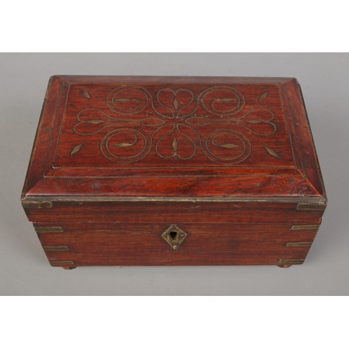 151 - An early 20th century Anglo Indian brass bound box with wire work inlaid decoration. Having fitted i... 