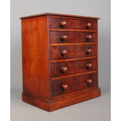 158 - A miniature mahogany five drawer chest in the Georgian style. Height 40cm, Width 34cm, Depth 21cm.