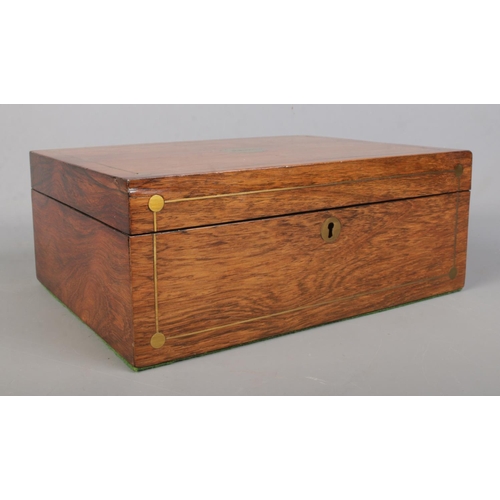 161 - A Victorian walnut jewellery box along with an inlaid mahogany box with double sided drawers, possib... 