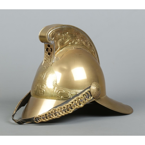 163 - A brass Merryweather fire helmet for the Metropolitan Fire Brigade.