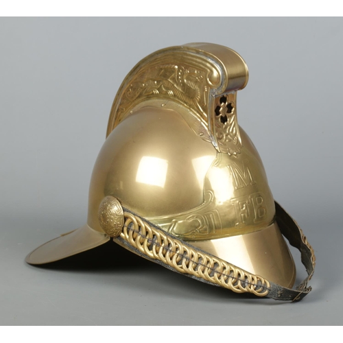 163 - A brass Merryweather fire helmet for the Metropolitan Fire Brigade.