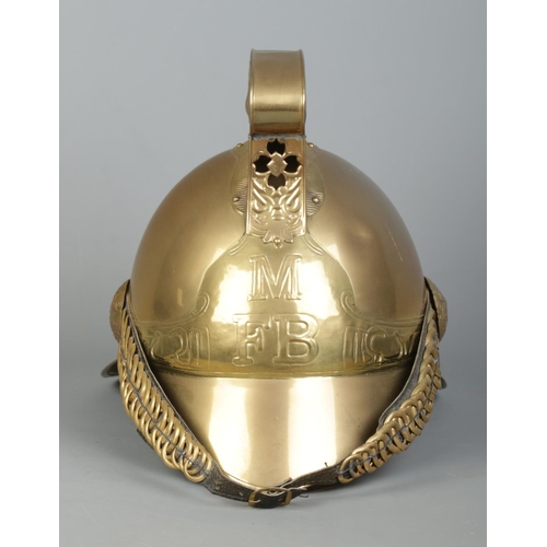 163 - A brass Merryweather fire helmet for the Metropolitan Fire Brigade.