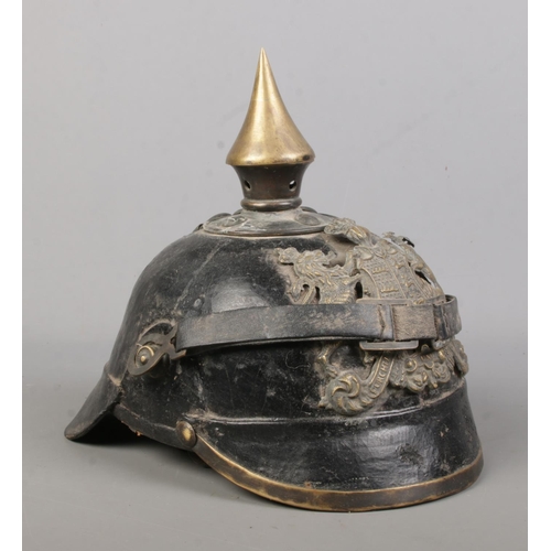 166 - An Imperial German Wurttemberg pickelhaube. Bearing coat of arms and motto Furchtlos Und Trew.