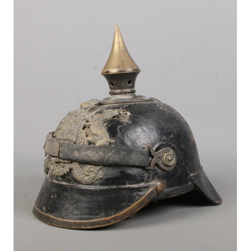 166 - An Imperial German Wurttemberg pickelhaube. Bearing coat of arms and motto Furchtlos Und Trew.