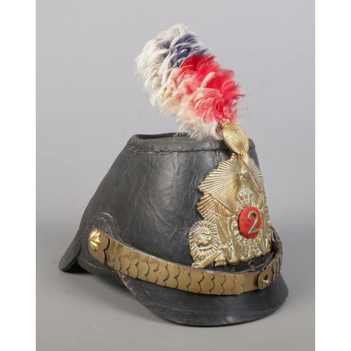 169 - A Prussian leather jager shako bearing coat of arms.