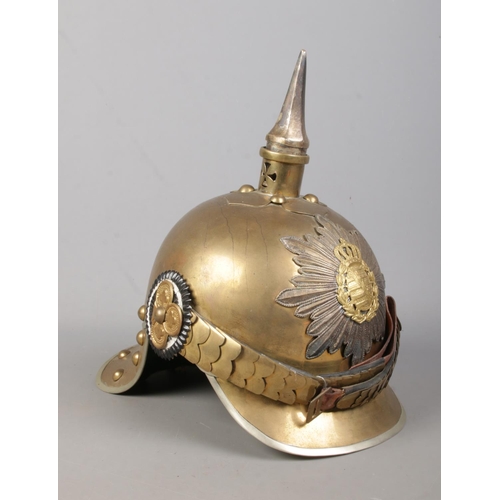 170 - A World War One pickelhaube bearing Saxon coat of arms.