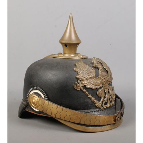 175 - A World War One Imperial German officers pickelhaube bearing eagle badge with motto Mit Gott Fur Koe... 