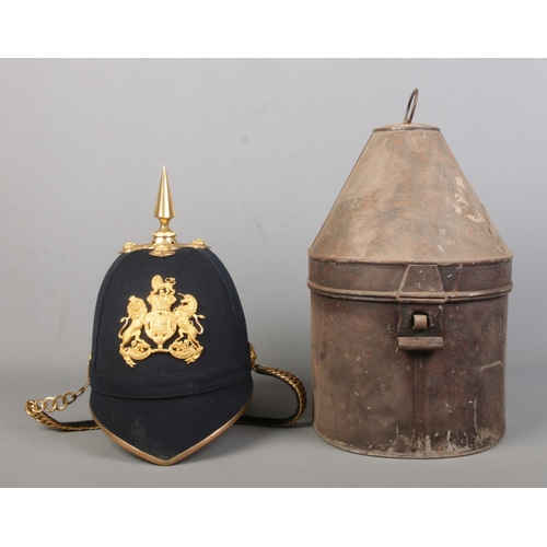 178 - A British Royal Artillery helmet with blue cloth and spike. Inside of helmet marked for Guthrie & Va... 