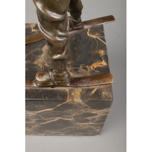 180 - After Johann Ferdinand Preiss, a bronze sculpture of a young boy wearing skis. Having HJ Ski Fuhrer ... 