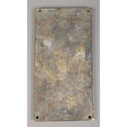 182 - A German bronze plaque commemorating the chancellery of Adolf Hitler. 29cm x 15cm.