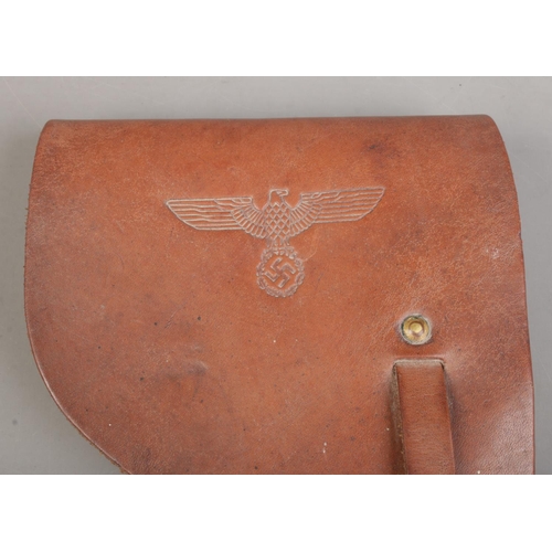 184 - A World War Two French Mab Model D leather gun holster with German capture stamps.