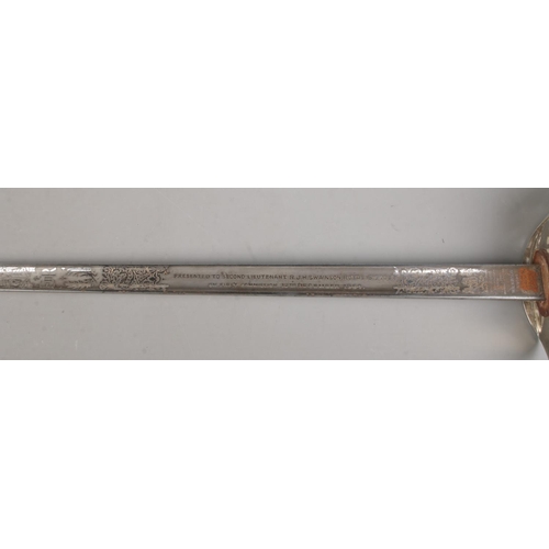 193 - An Elizabeth II 1897 pattern Infantry Officer's sword by Wilkinson Sword. Having ER crowned cypher a... 