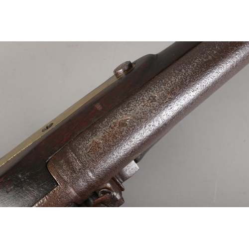 195 - A 19th century rifle with walnut stock. Percussion conversion from flint lock. The lock plate bearin... 