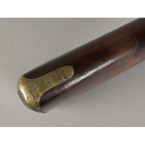 195 - A 19th century rifle with walnut stock. Percussion conversion from flint lock. The lock plate bearin... 