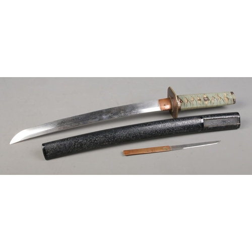 200 - A Japanese Meiji period Wakizashi. Having bronze Tsuba and wrapped Samegawa Tsuka with bird Menuki. ... 