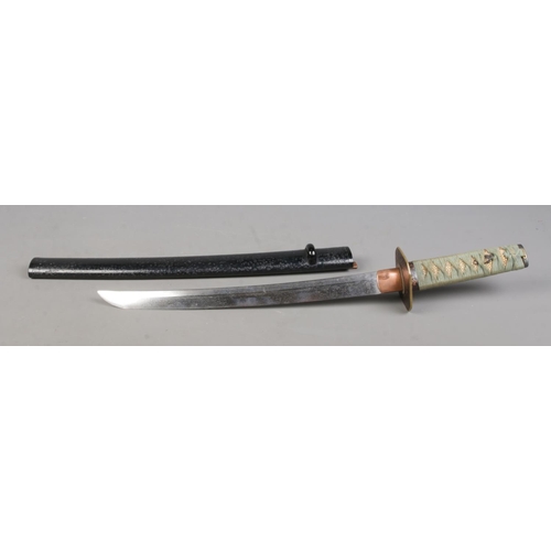 200 - A Japanese Meiji period Wakizashi. Having bronze Tsuba and wrapped Samegawa Tsuka with bird Menuki. ... 