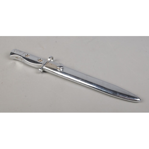 201 - A British L1A3 SLR ceremonial issue bayonet with scabbard. Blade length 20cm. CANNOT POST OVERSEAS.