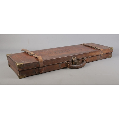 203 - A 19th century leather gun case with fitted interior. Marked for WJ Worden, Southport and having bra... 