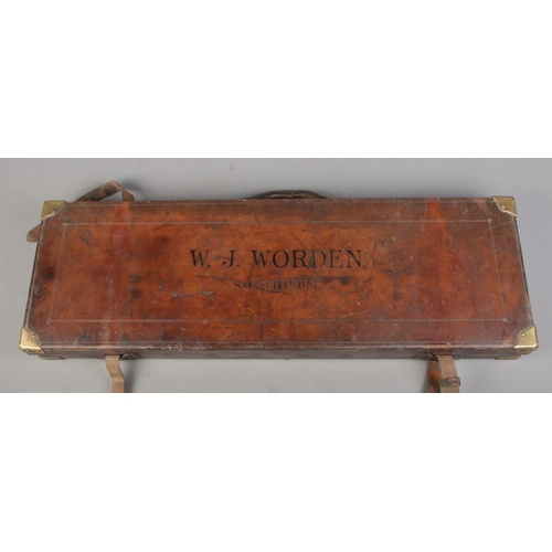 203 - A 19th century leather gun case with fitted interior. Marked for WJ Worden, Southport and having bra... 