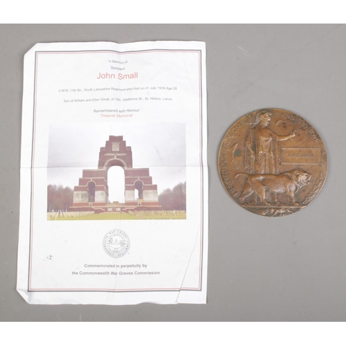 213 - A World War One bronze memorial plaque/death penny awarded to John Small.