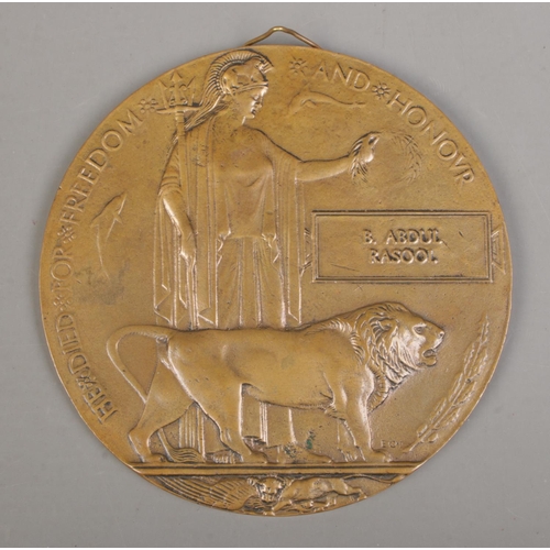 220 - A World War One bronze memorial plaque/death penny awarded to B Abdul Rasool.