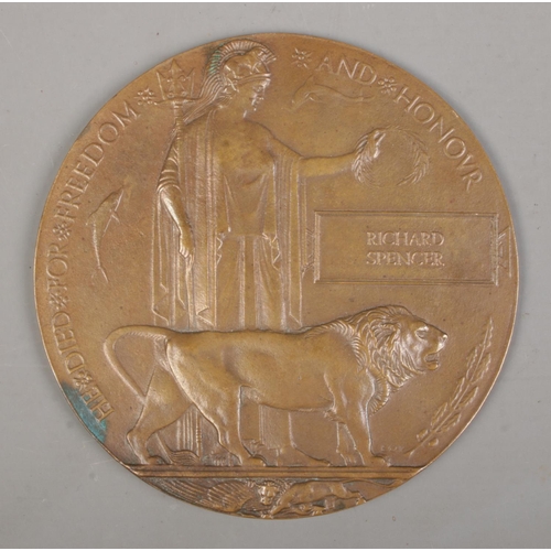 222 - A World War One bronze memorial plaque/death penny awarded to Richard Spencer.