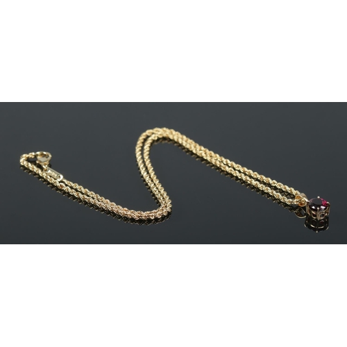 237 - A Chopard 18ct gold rope twist necklace with red stone pendant. Stamped LUC 750 and signed Chopard. ... 