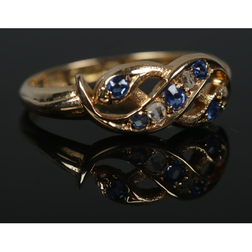 247 - An early 20th century 18ct gold sapphire and diamond intertwined snake ring. Hallmarks for Birmingha... 