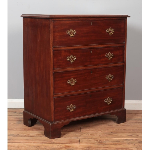 296 - A Georgian mahogany secretaire chest of drawers. Height 97cm, Width 82cm, Depth 48cm.