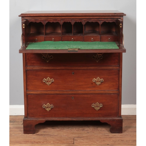 296 - A Georgian mahogany secretaire chest of drawers. Height 97cm, Width 82cm, Depth 48cm.