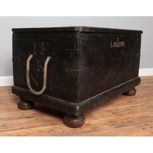 313 - A painted wooden trunk stencilled for British East India Trading Company. Height 55cm, Width 95cm, D... 