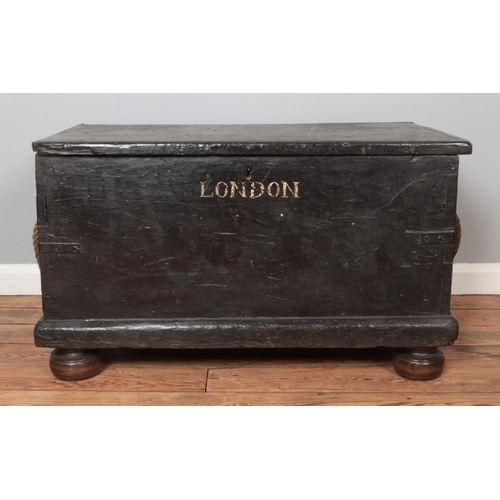 313 - A painted wooden trunk stencilled for British East India Trading Company. Height 55cm, Width 95cm, D... 