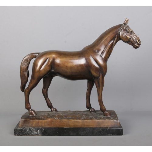 62 - After Piere Jules Mene, a large bronze sculpture of a horse raised on marble base. Signed P J Mene, ... 