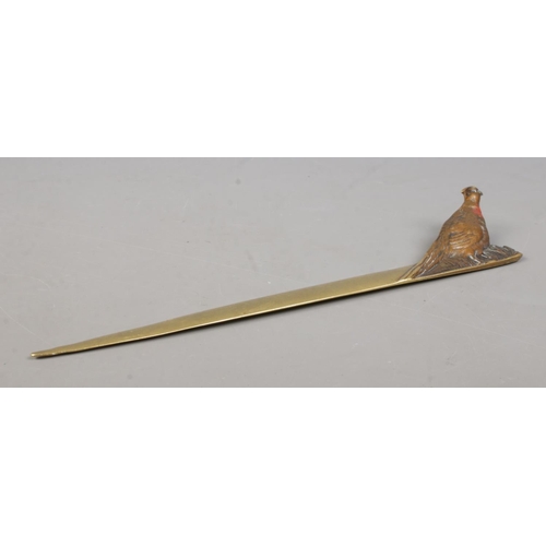 72 - A bronze letter opener decorated with a cold painted pheasant. Stamped Made In Austria to underside.... 