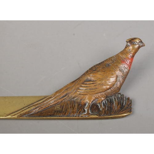 72 - A bronze letter opener decorated with a cold painted pheasant. Stamped Made In Austria to underside.... 