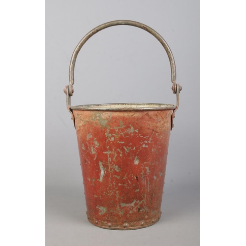 76 - A George V metal fire bucket. Stencilled 'SAND' with crowned GRV cypher. Height 24cm.