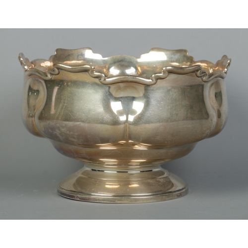 81 - An Edwardian silver punch bowl. Assayed Sheffield 1907 by Atkin Brothers. Height 16cm, Diameter 25cm... 